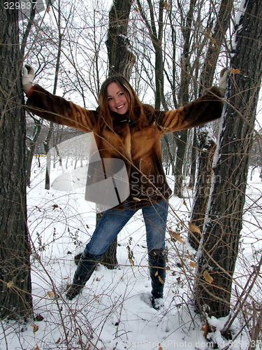 Image of The beautiful girl in the winter in park 3