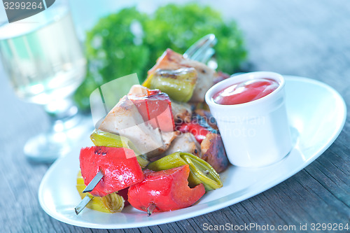 Image of fried kebab with sauce