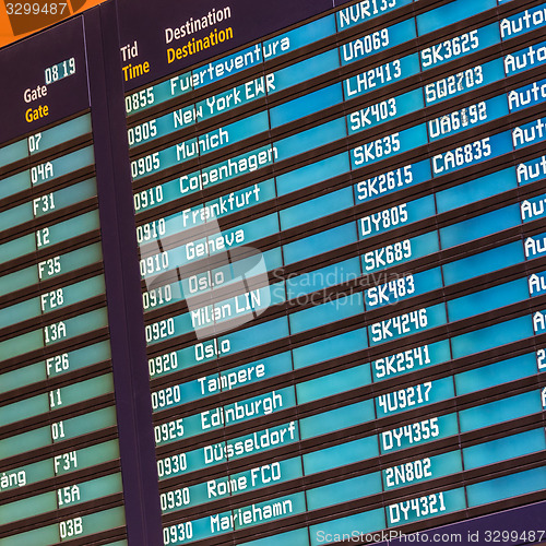 Image of Flight departures board.