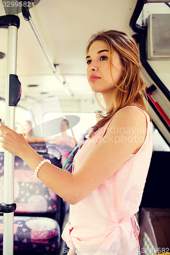 Image of teenage girl going by bus