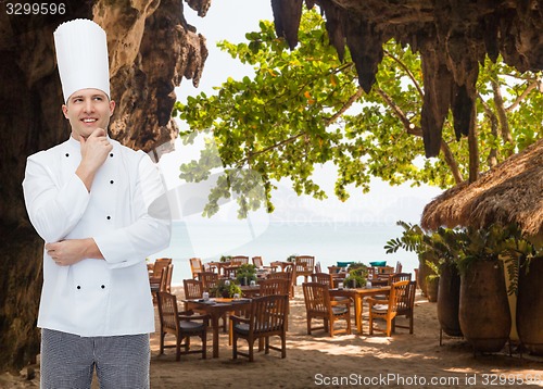 Image of happy male chef cook thinking