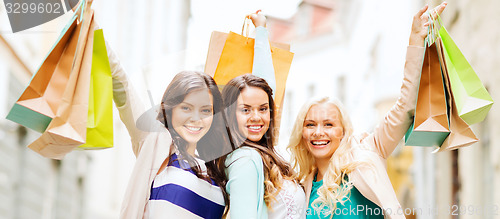 Image of girls with shopping bags in ctiy