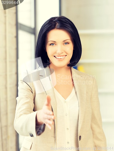 Image of woman with an open hand ready for handshake