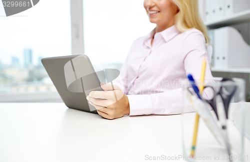 Image of smiling business woman or student with tablet pc
