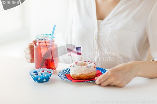 Image of woman celebrating american independence day