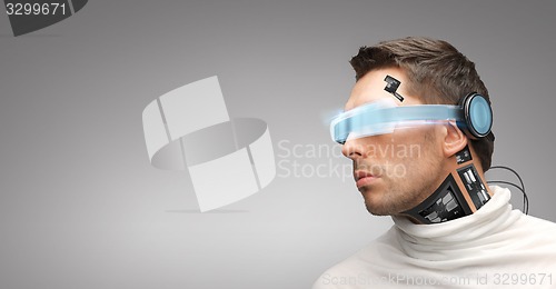 Image of man with futuristic glasses and sensors