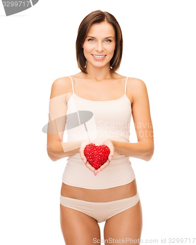 Image of beautiful woman in cotton underwear and red heart