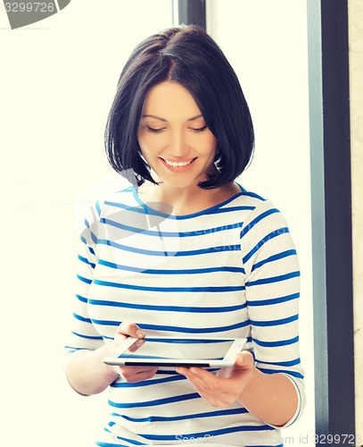 Image of happy teenage girl with tablet pc computer