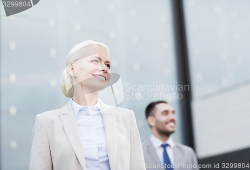 Image of close up of smiling businessmen