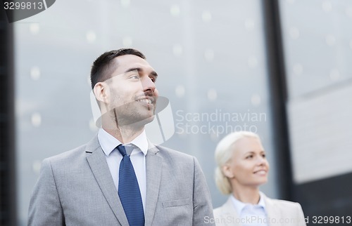 Image of close up of smiling businessmen