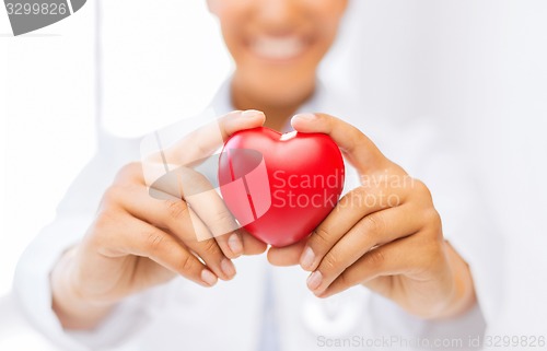 Image of woman hands with heart