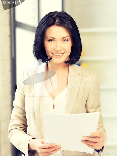 Image of happy woman with documents