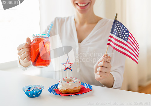 Image of happy woman celebrating american independence day