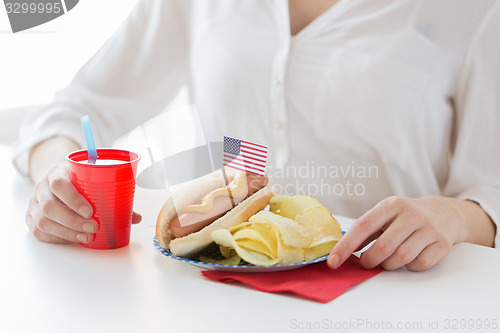 Image of woman celebrating american independence day