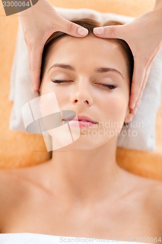 Image of beautiful woman in spa salon