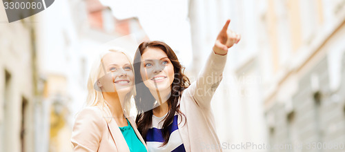 Image of girls with shopping bags in ctiy