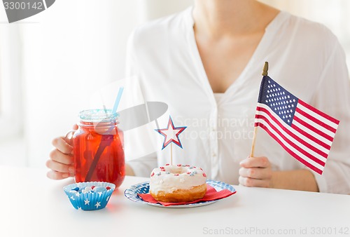 Image of woman celebrating american independence day