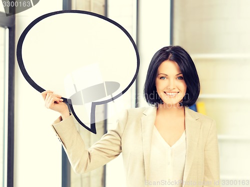 Image of smiling businesswoman with blank text bubble