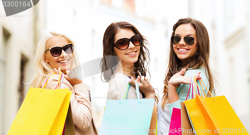 Image of girls with shopping bags in ctiy