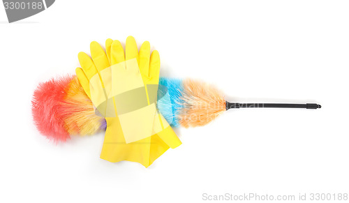 Image of Yellow cleaning gloves with a duster