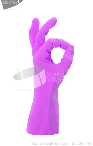 Image of Hand gesturing with purple cleaning product glove