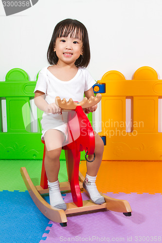 Image of Children Riding Trojan