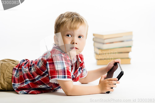 Image of boy with a Tablet PC. studio