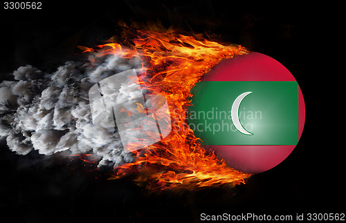 Image of Flag with a trail of fire and smoke - Maldives