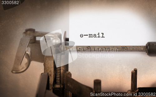 Image of Old typewriter with paper