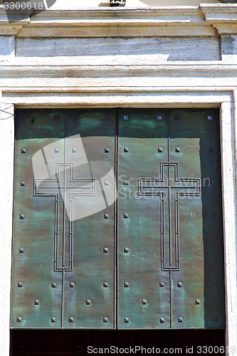 Image of abstract  church door    in i   lombardy   column  the milano ol