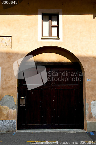 Image of brown door  europe  italy     in  the milano old    brick terrac