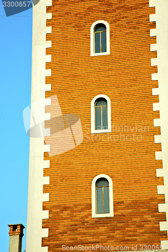 Image of  sunny day    milan     in  italy   the   wall  and church tower
