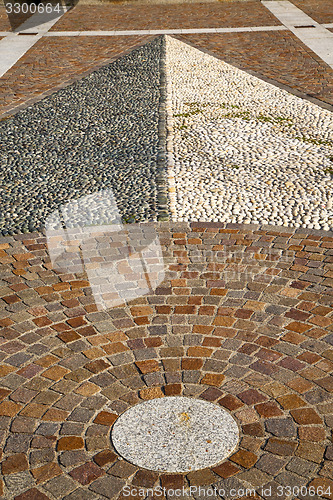 Image of near mozzate street  abstract   pavement of  curch and wall marb