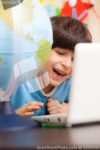 Image of child on a geography lesson