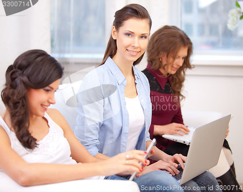 Image of Three girls and a laptop