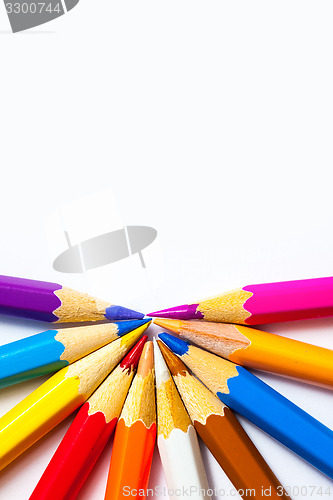 Image of colored pencils on white background