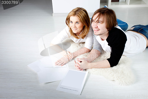 Image of young couple planning