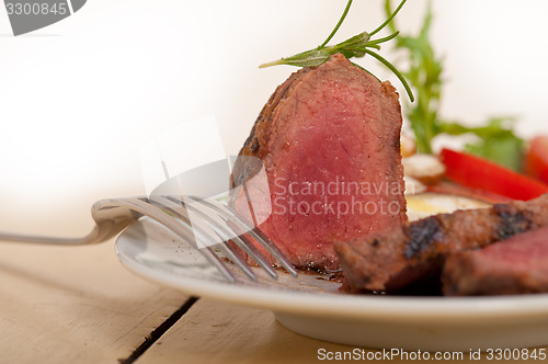 Image of beef filet mignon grilled with vegetables