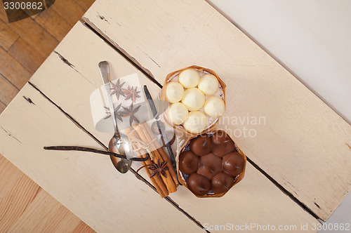 Image of chocolate vanilla and spices cream cake dessert 