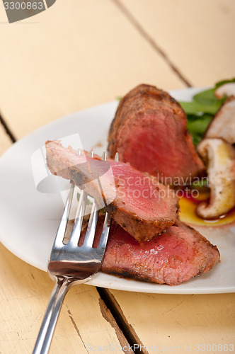 Image of beef filet mignon grilled with vegetables