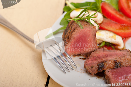 Image of beef filet mignon grilled with vegetables