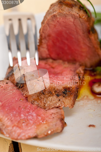 Image of beef filet mignon grilled with vegetables