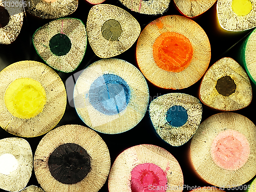 Image of Colorful wooden crayons closely.