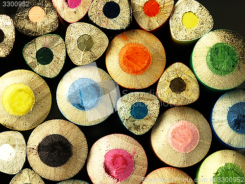 Image of Colorful wooden crayons closely.