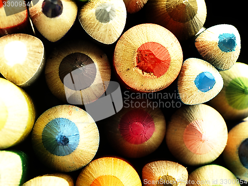 Image of Colorful wooden crayons closely.