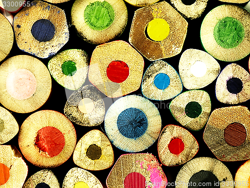 Image of Colorful wooden crayons closely.