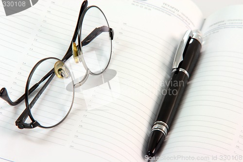 Image of diary and spectacles