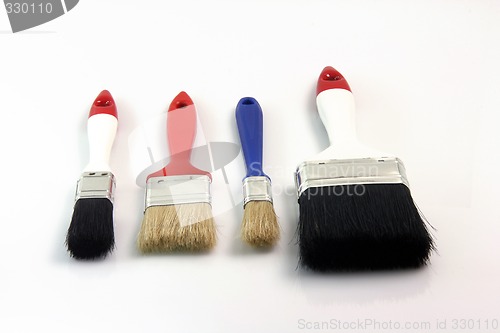 Image of four paint brushes