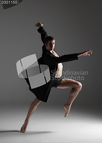 Image of The young attractive modern ballet dancer on white background