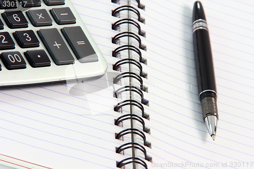 Image of note book and pen